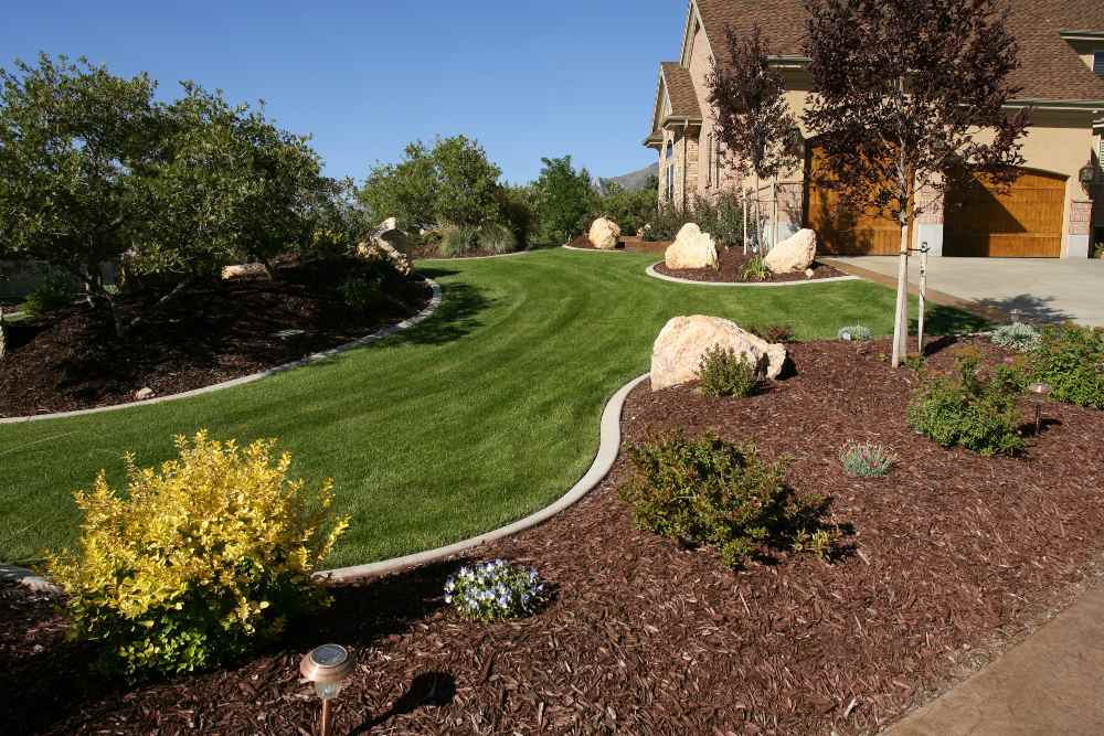Completed landscape project with rocks and plants in Ogden, UT, Sandee's Soil & Rock